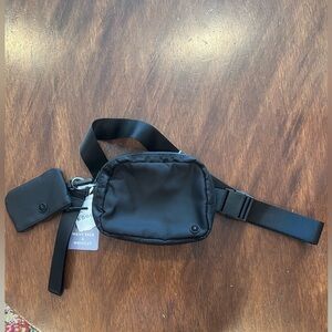 NWT Gaiam wristlet and wait pack. Black